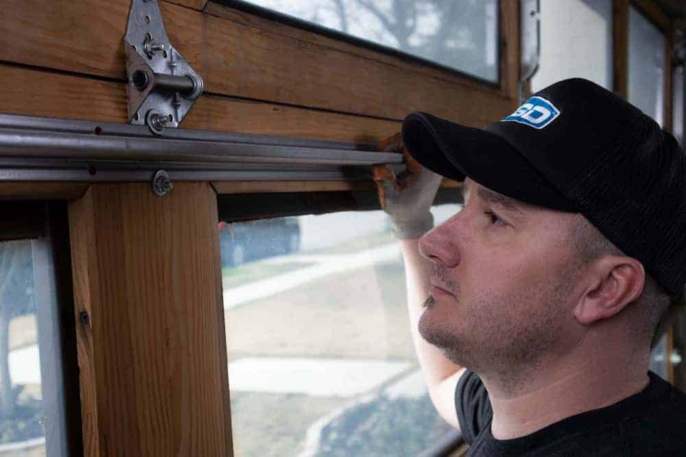 Garage door technician installing a new garage door in Columbia South Carolina