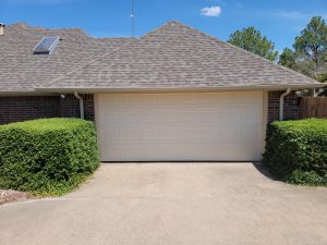 Short raised panel steel garage door