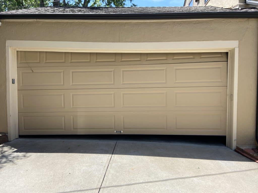 Uneven garage door opening